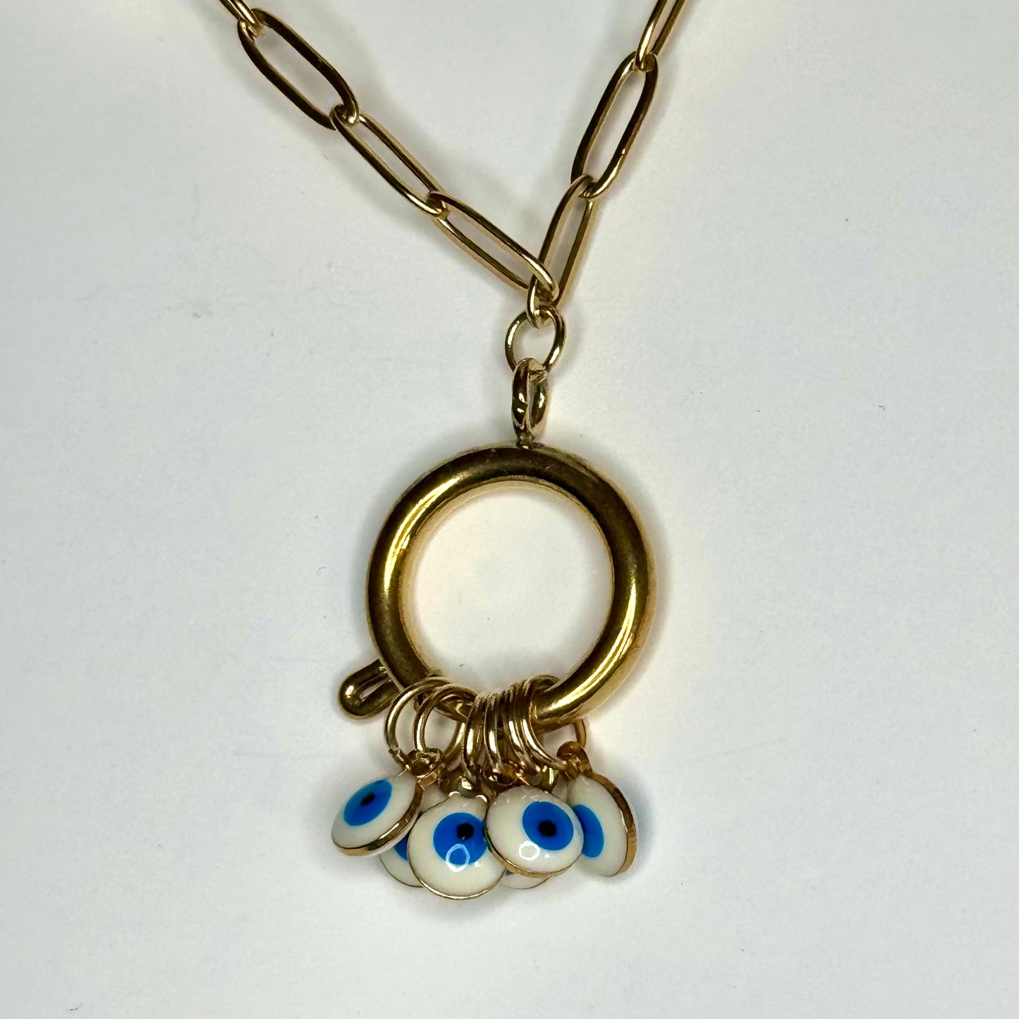 Fio Inox Dourado - Argola com Olhos Turcos (Varientes Preto, Azul, Branco)