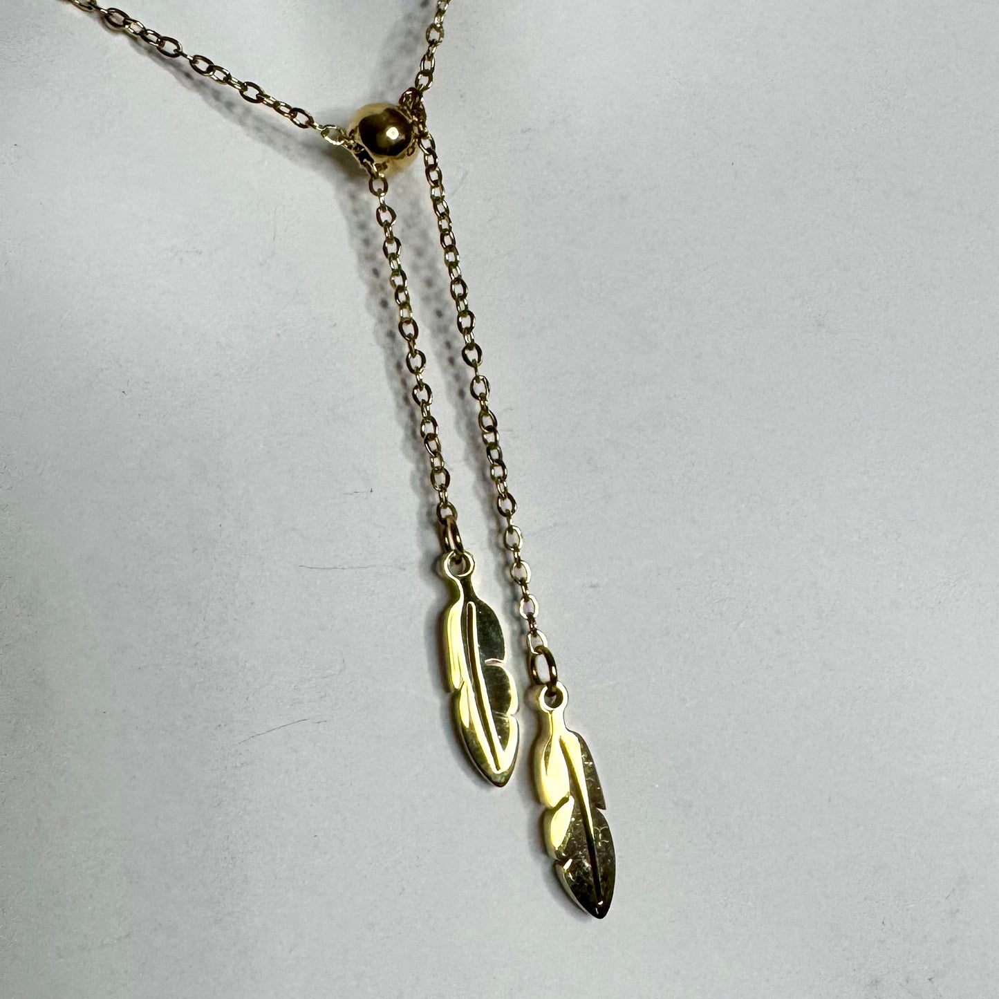 Fio Inox Dourado - Penas