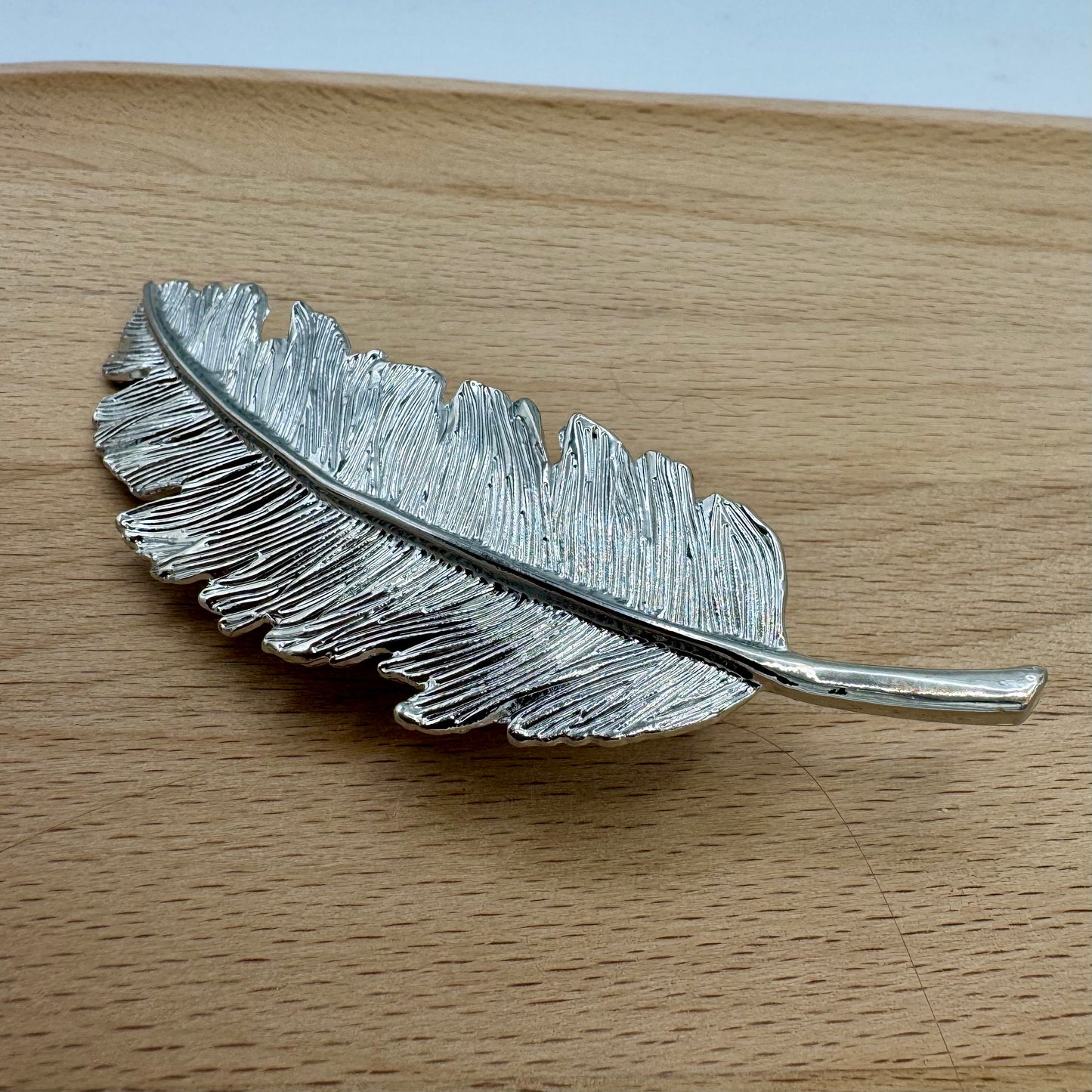 Mola de Cabelo Pena Grande Prateado