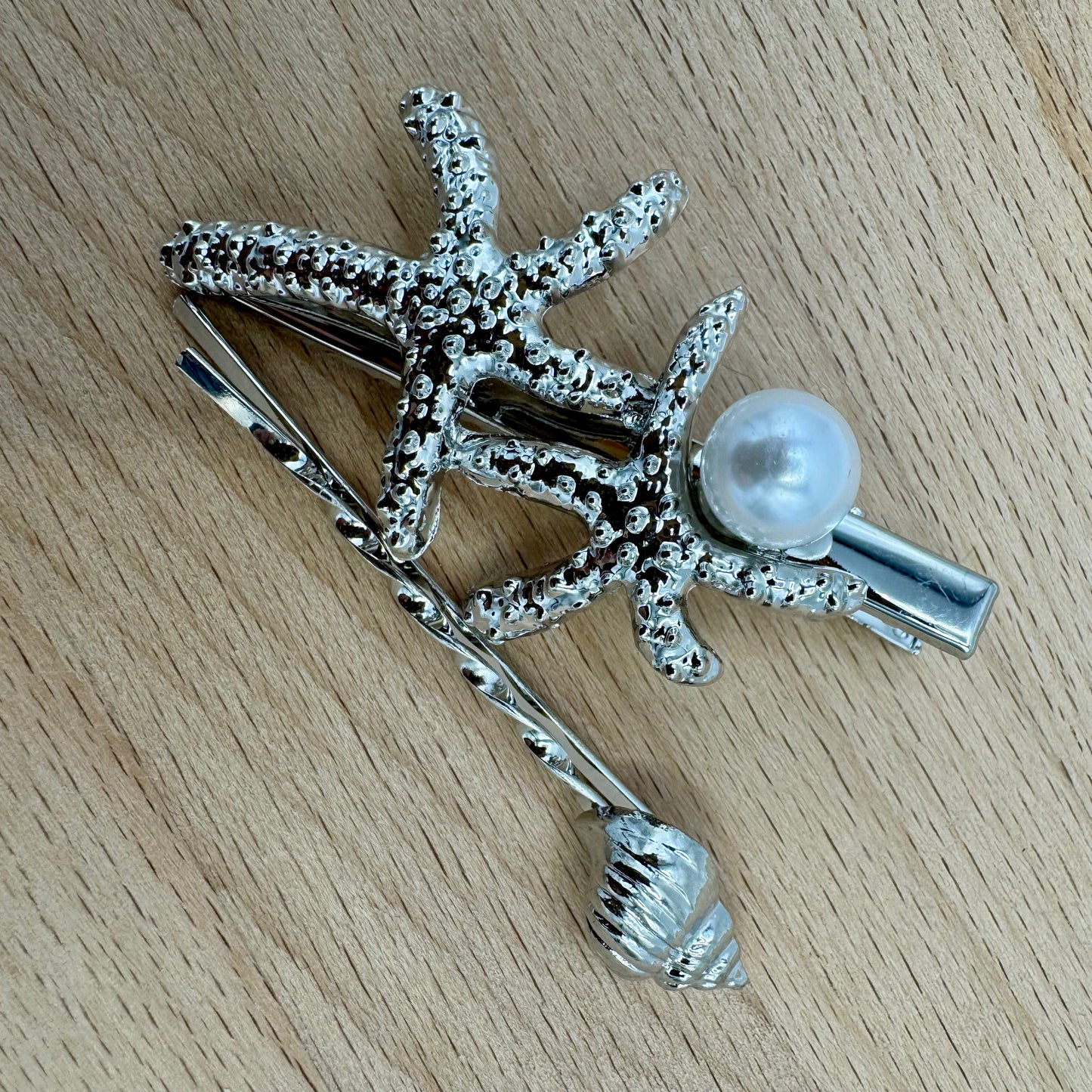 Gancho e Mola Cabelo Prateado Buzio e Estrelas do Mar