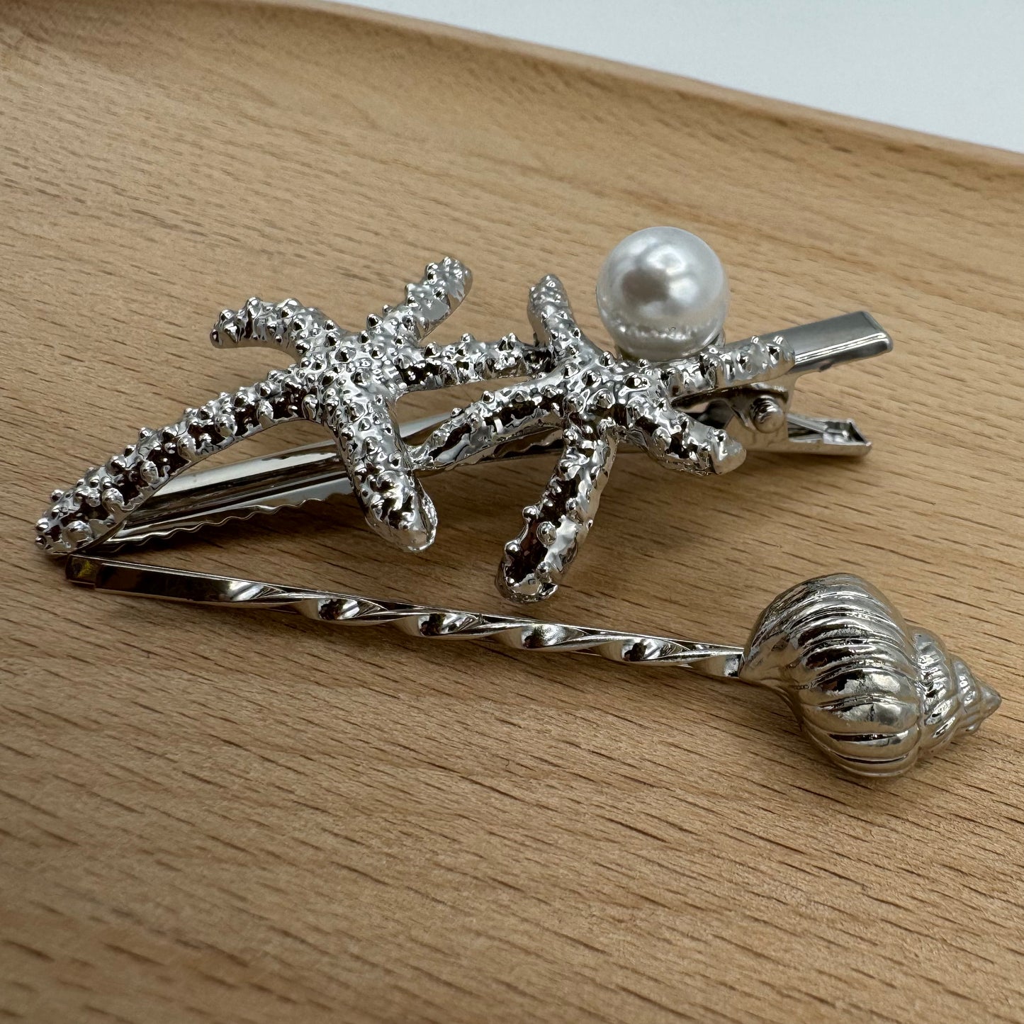 Gancho e Mola Cabelo Prateado Buzio e Estrelas do Mar